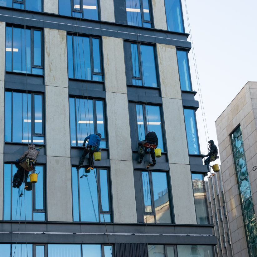 Warsaw, Poland - December 5, 2019: Window Cleaners in Old Town Centre in Warsaw. Editorial Image View